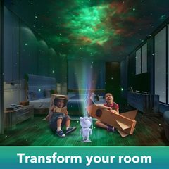 Children playing in a room lit by the astronaut projector