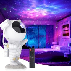 Weißer Astronaut Projektor in einem Schlafzimmer, die Fernbedienung davor